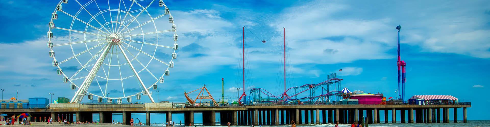 A view of the roller coasters & ferris wheel in Atlantic City New Jersey